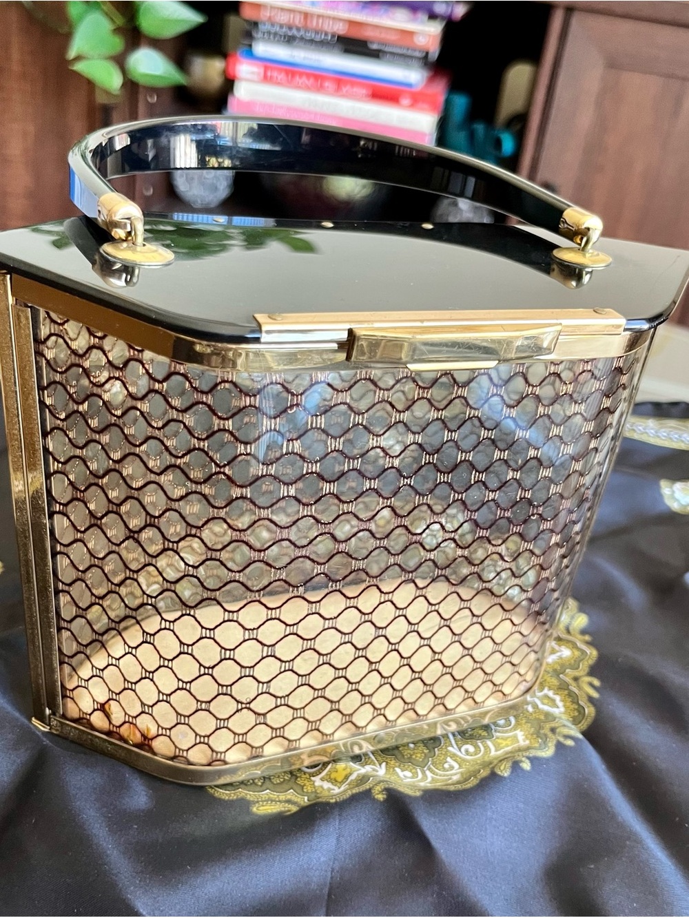 Mid-century modern plastic purse in the style of Majestic.